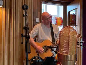 Matz records acoustic guita