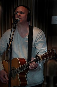 Matz records his vocals in the studio.
