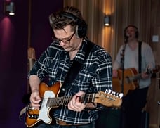 peter_gunnebro Guitarist Peter Gunnebro records electric guitar in the studio
